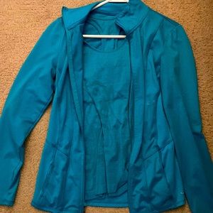 Champion Duo Dry. Womens turquoise stretch zip jacket with matching athletic top